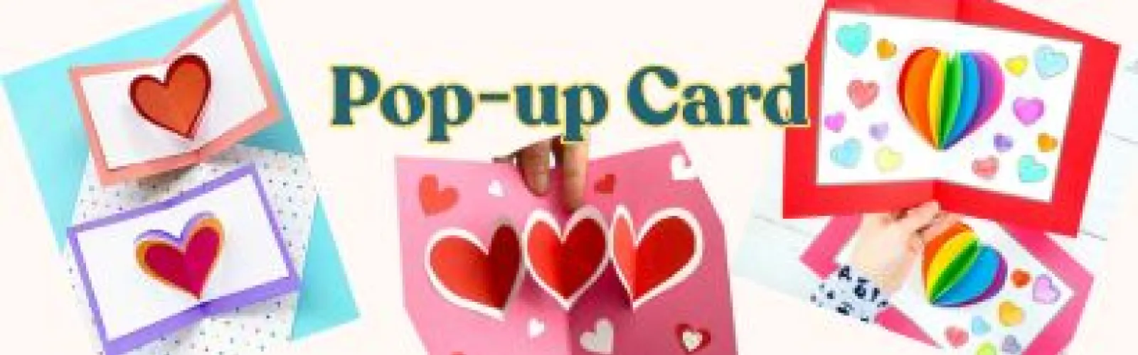 Five heart pop up cards and a hand holding them