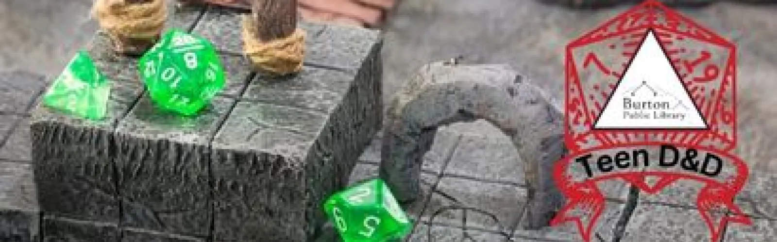 D&D table with green dice