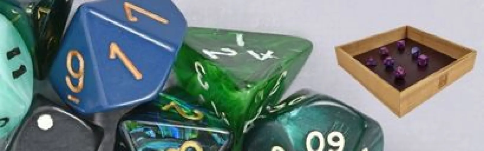 Dungeons and dragons dice and a dice rolling tray